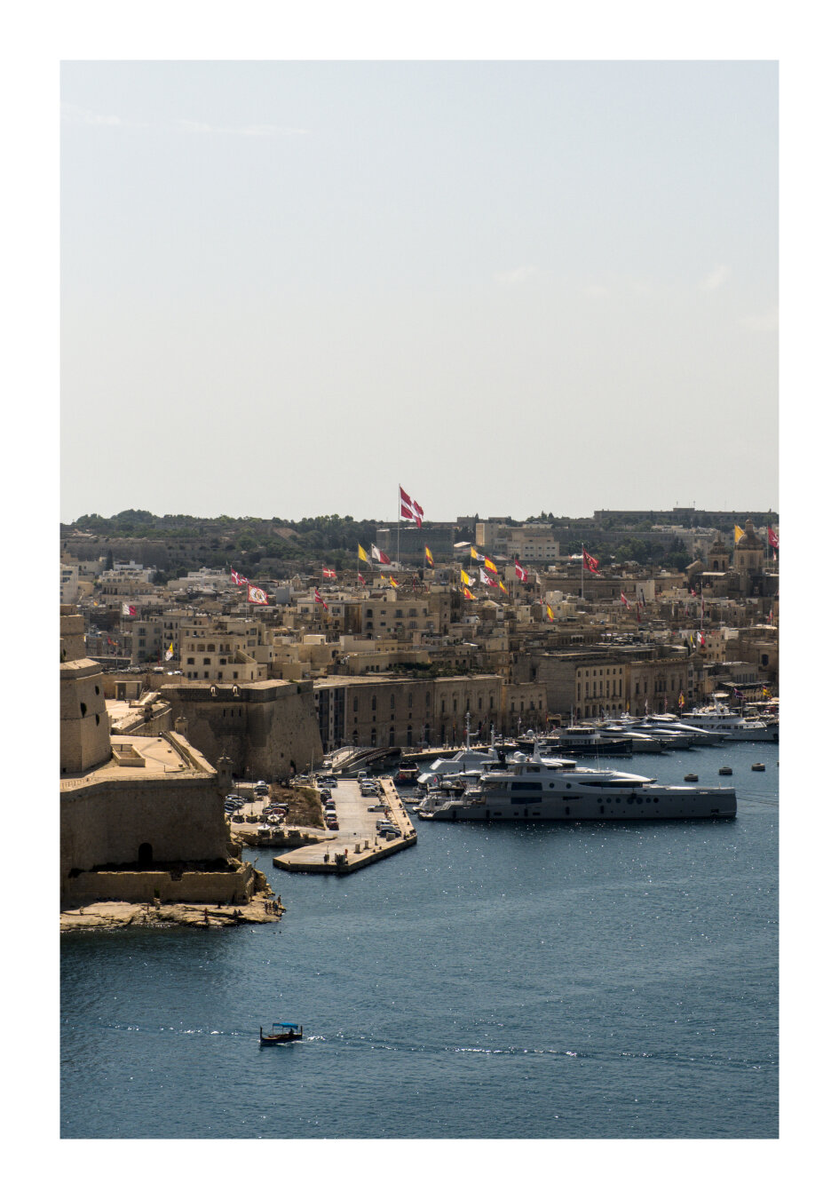Hoisted flags in preparation for Santa Marija feast