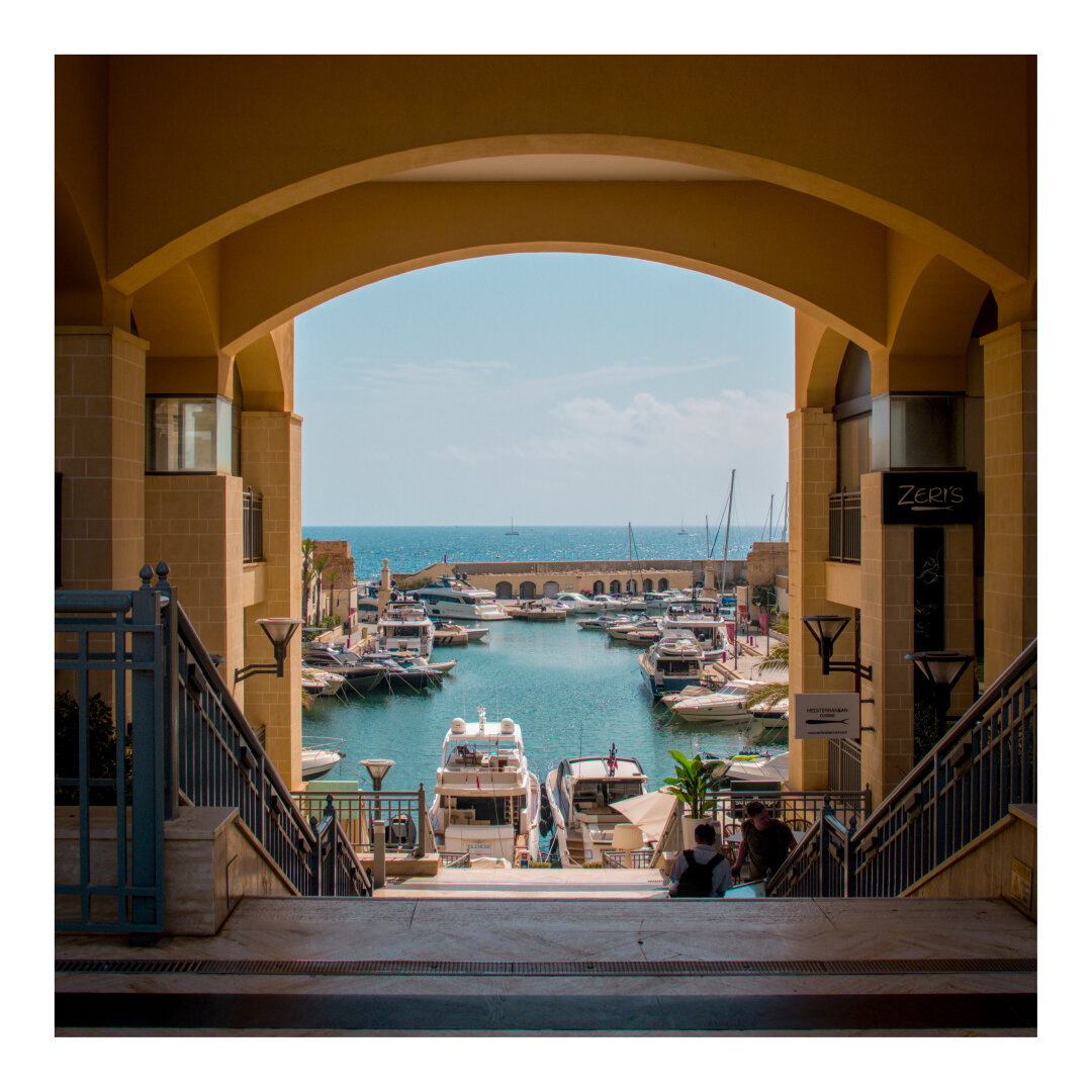 Portamoso Marina through the archway in St Julians
