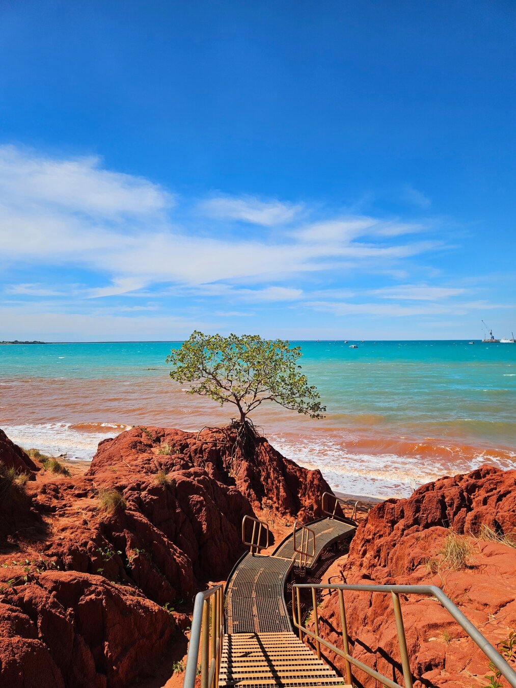 🌿 Chapter Fourteen — Roots in Red Earth

A lone tree, clinging to red cliffs, reaching for turquoise seas.
Broome taught me about resilience — how beauty grows strongest where the contrast is sharpest.

#BroomeLife #RedEarth #OceanMagic #MalikasRealm