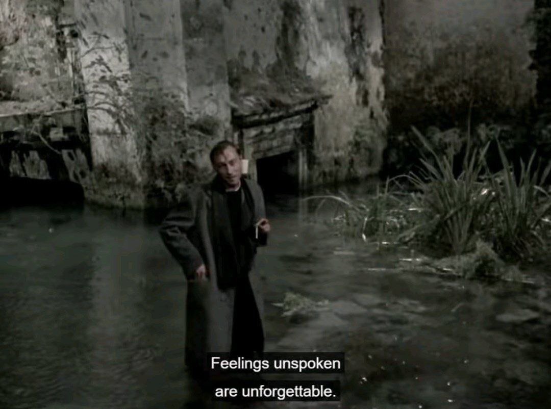 A man in a river saying : "feelings unspoken are unforgettable"
