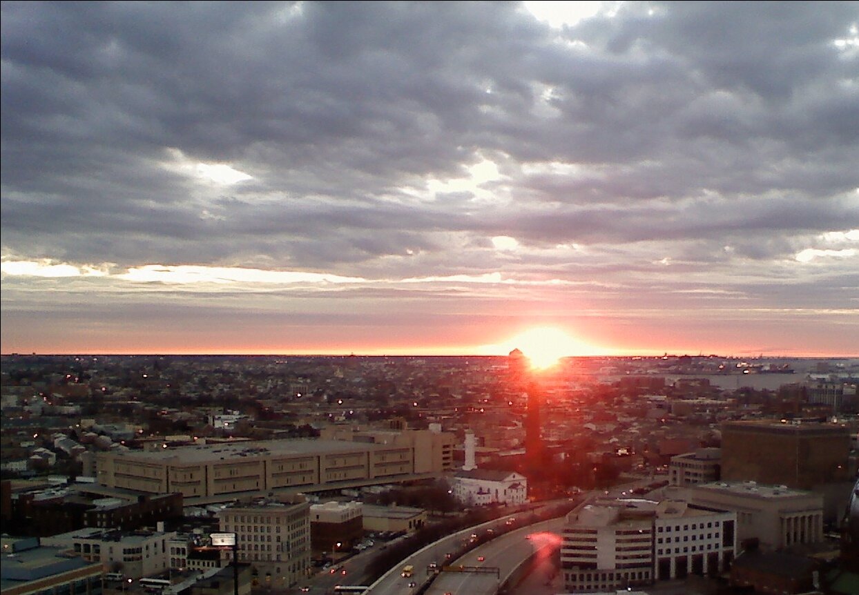 A view from the 20th floor at Mercy Hospital in downtown Baltimore facing East. At the horizon, you can see the sun beginning to reveal itself.