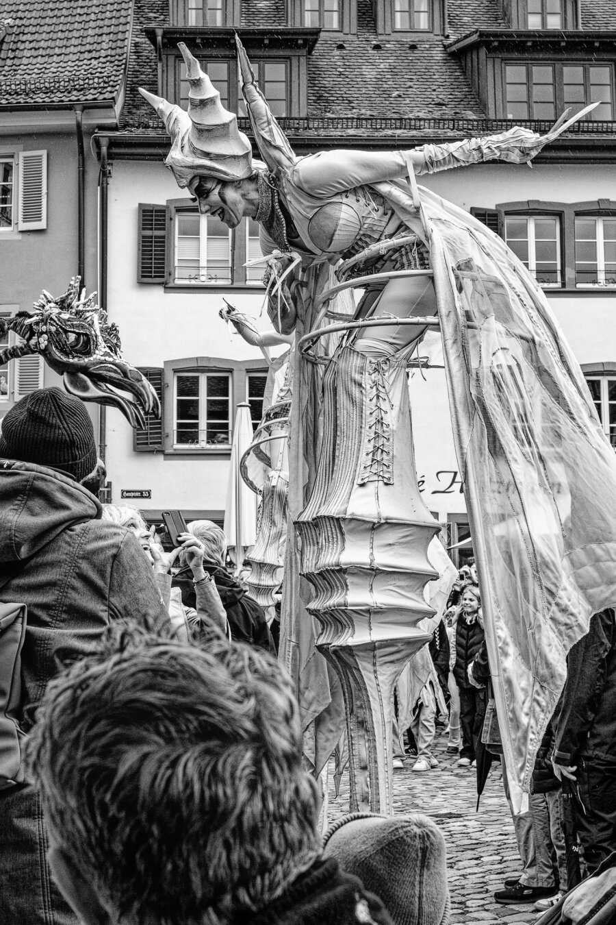 Artists on stilts at a street festival in Staufen