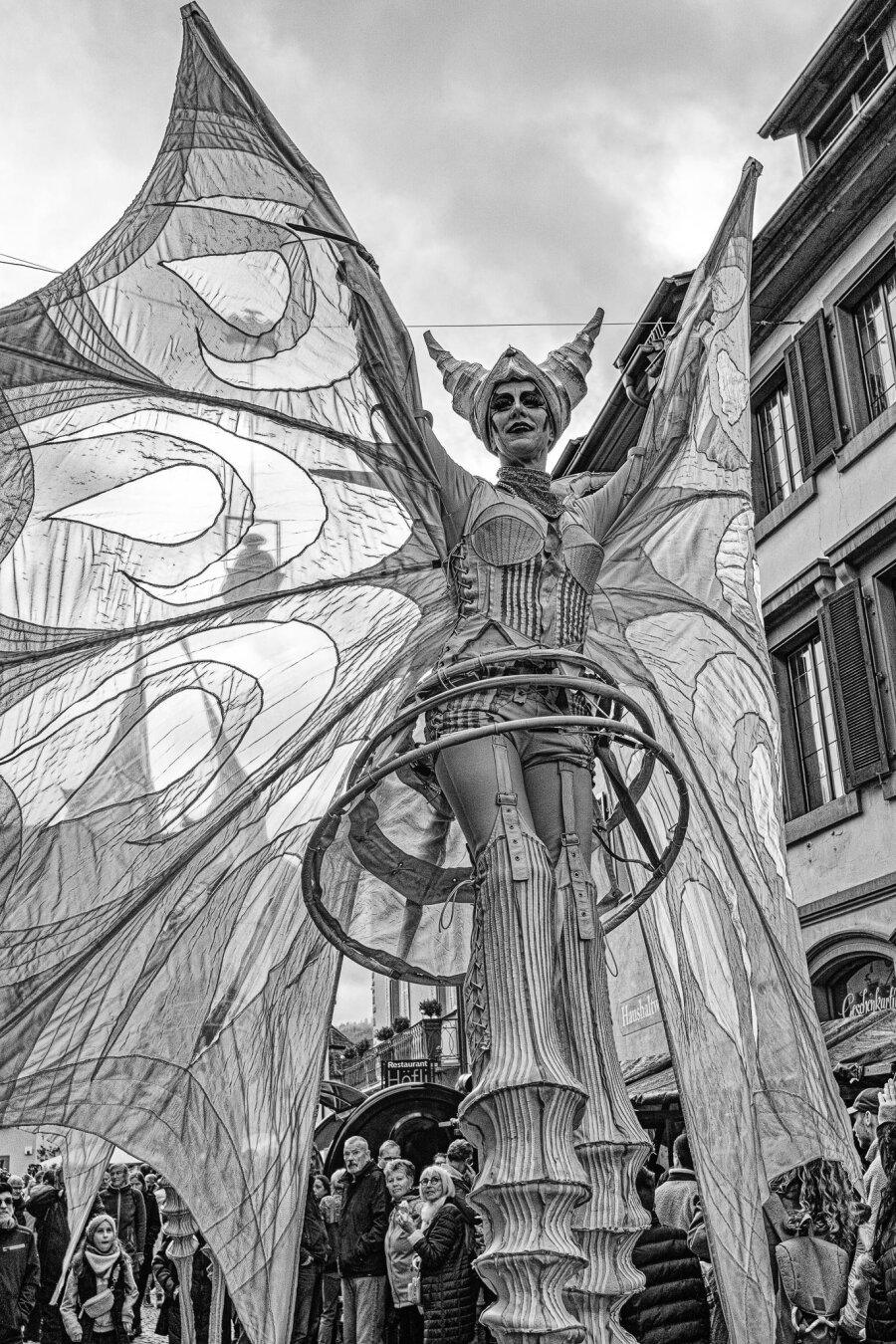 Artists on stilts at a street festival in Staufen