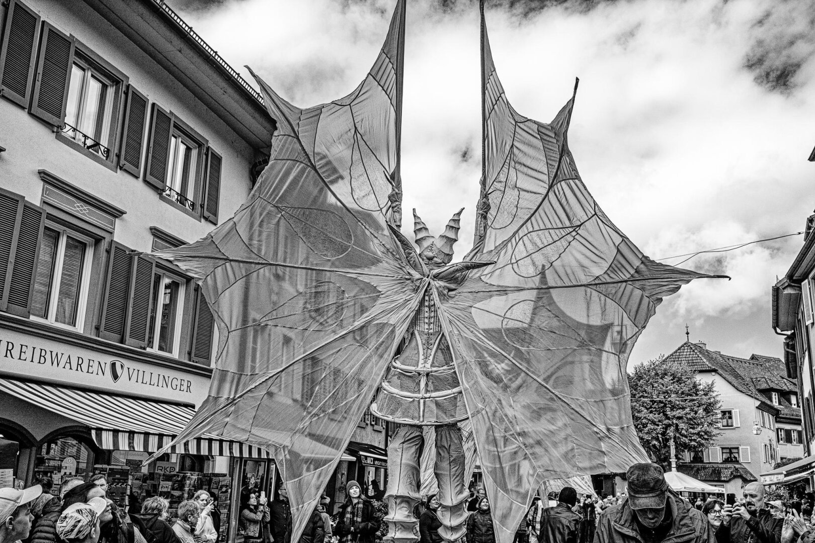 Artists on stilts at a street festival in Staufen