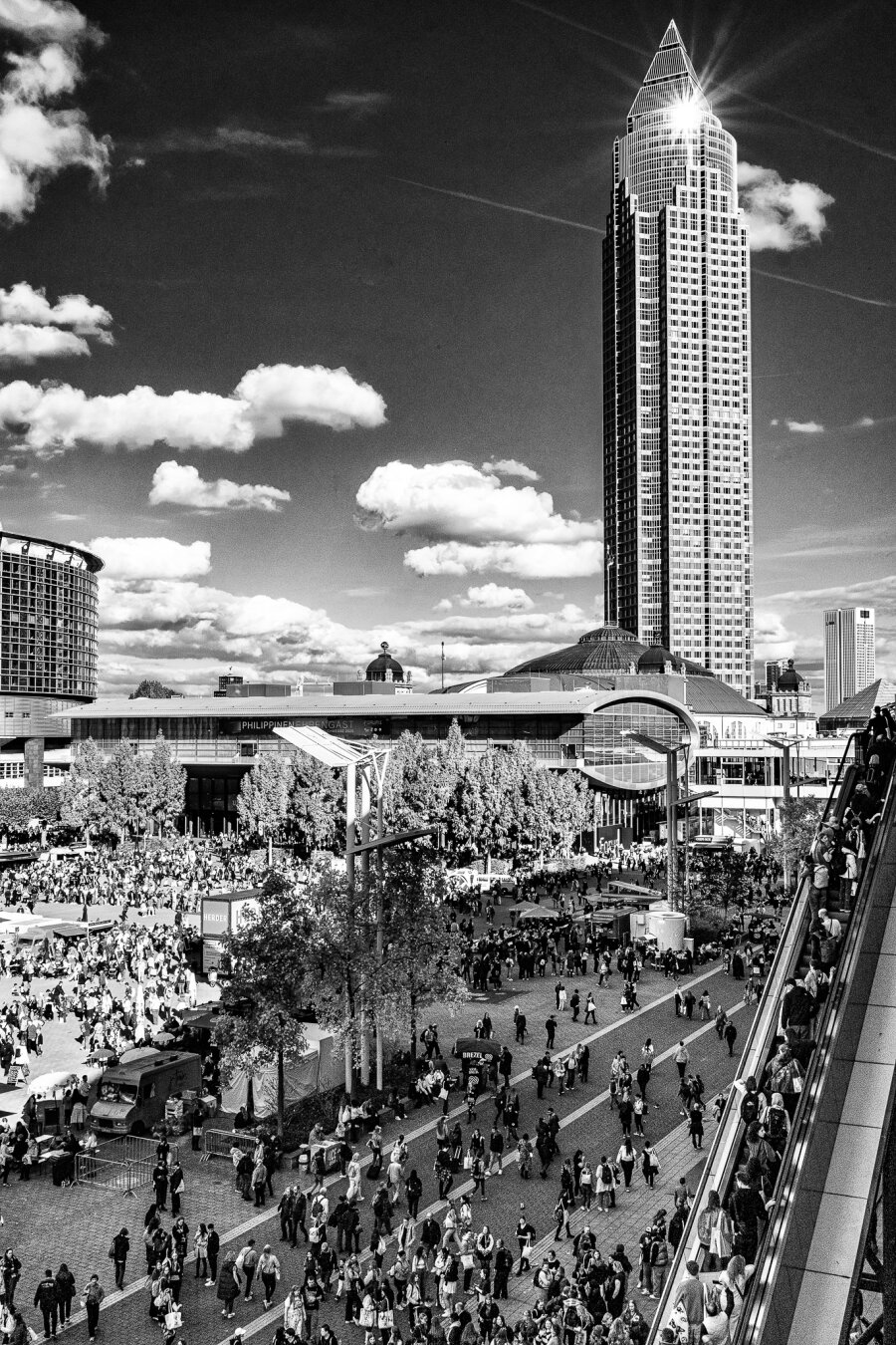 A skyscraper with a sun star photographed during the Frankfurt Book Fair.