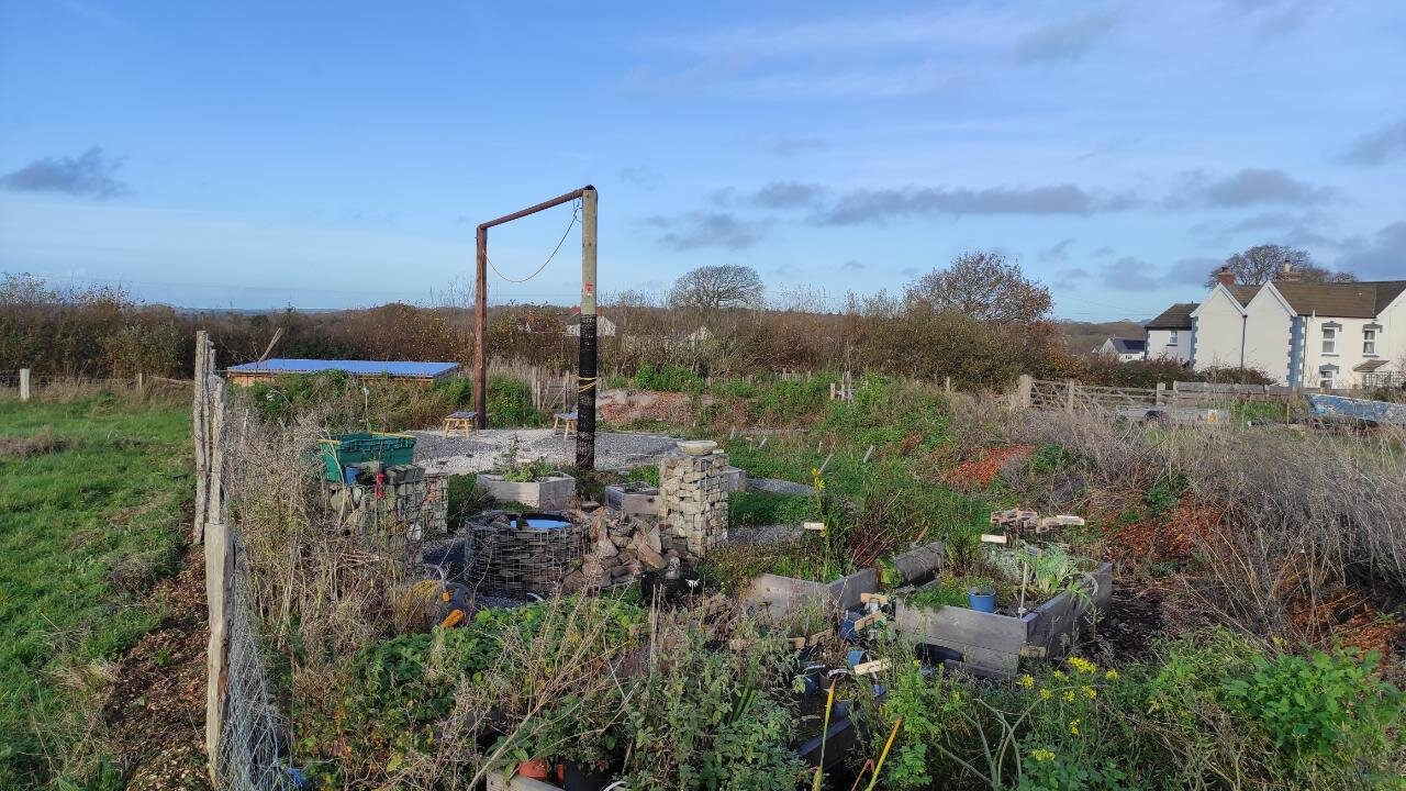 2 telegraph poles and crossbar in new garden