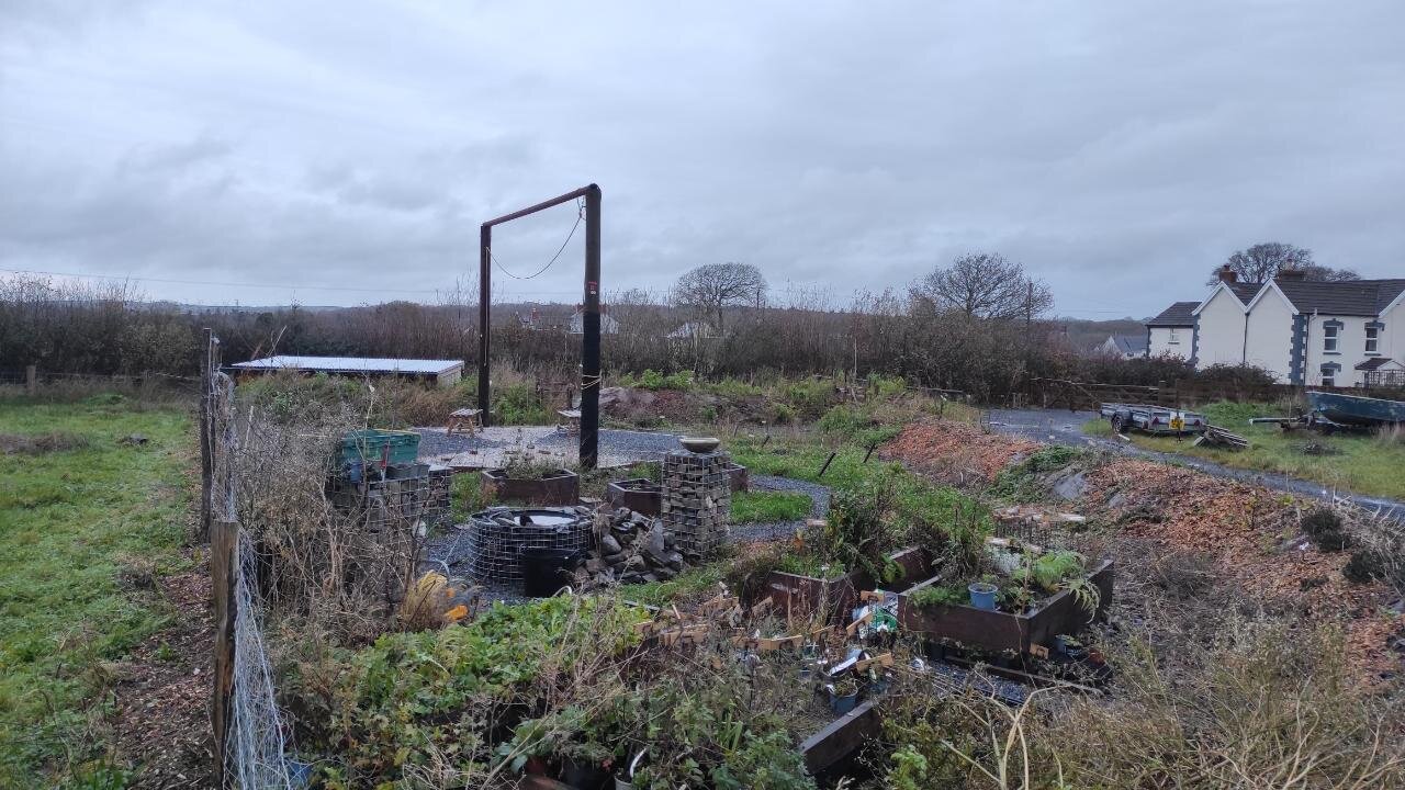 2 telegraph poles and crossbar in new garden