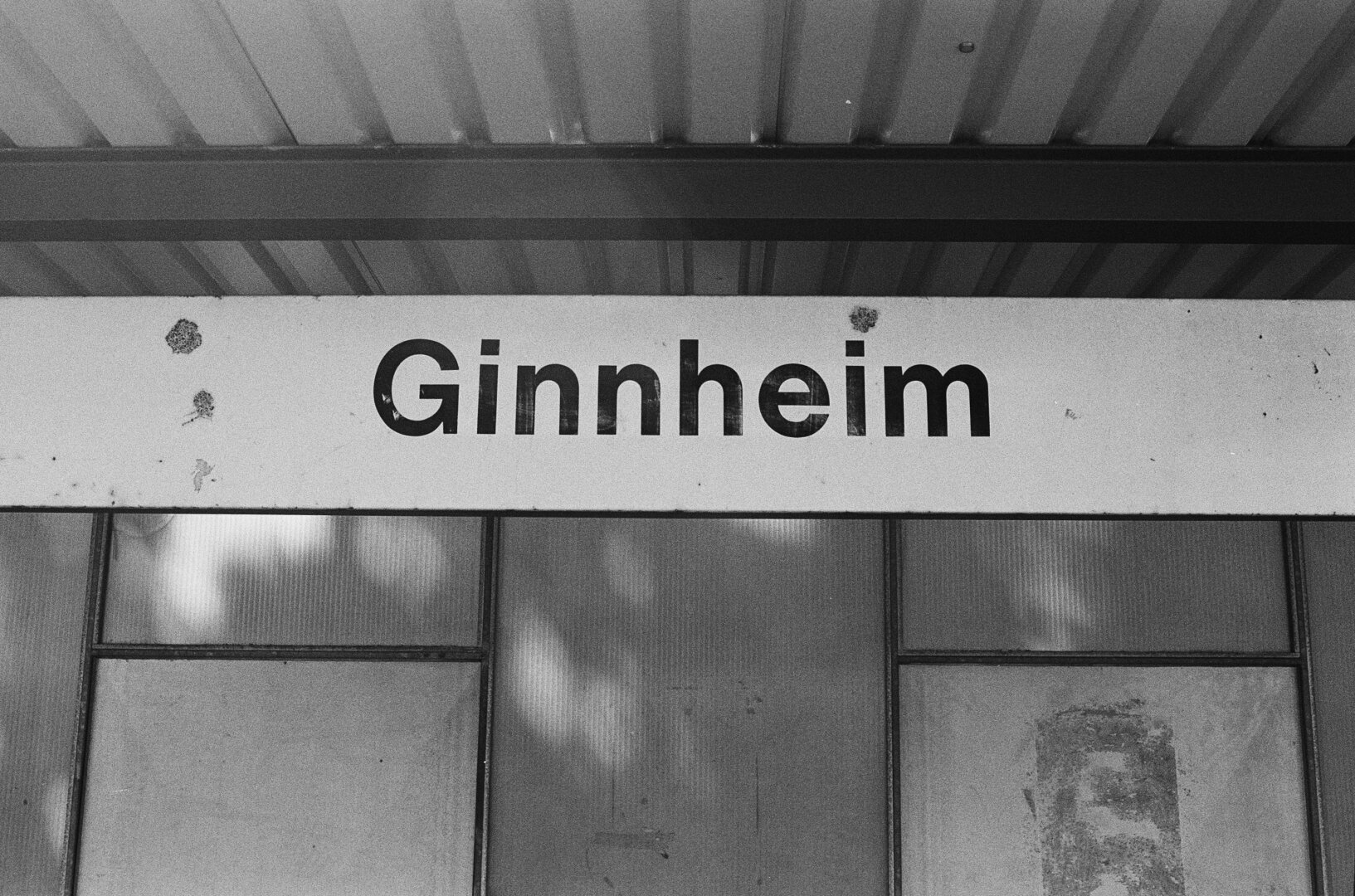 A huge „Ginnheim“ sign at the metro station. For some its the end of the line, for some the start.