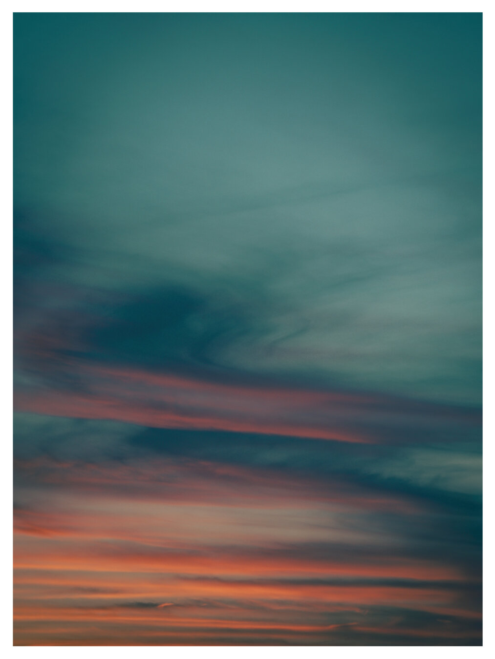 serene sunset sky with horizontal stripes of warm orange and deep purple, blending into muted blues and greens